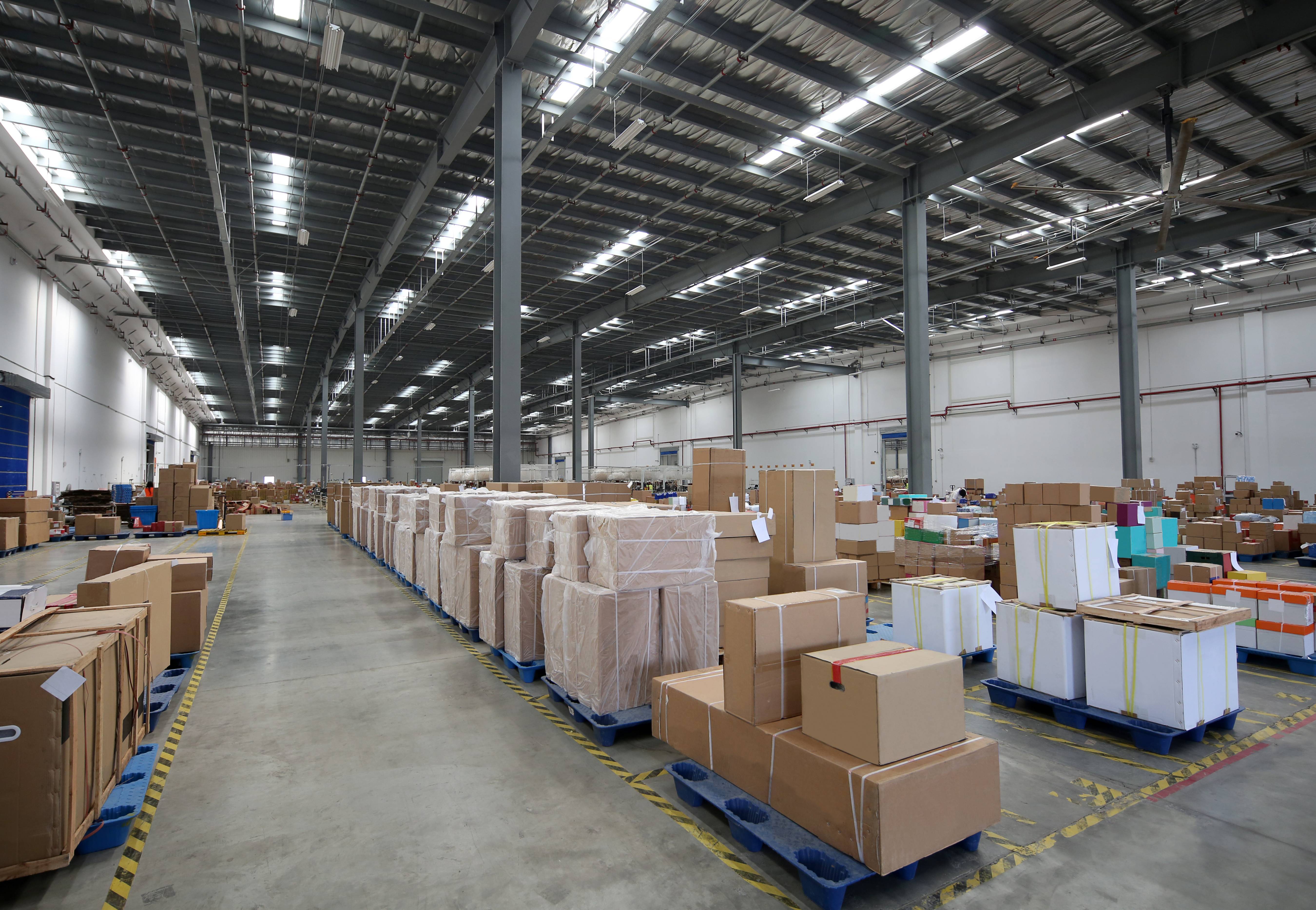 Boxes stored in a warehouse facility